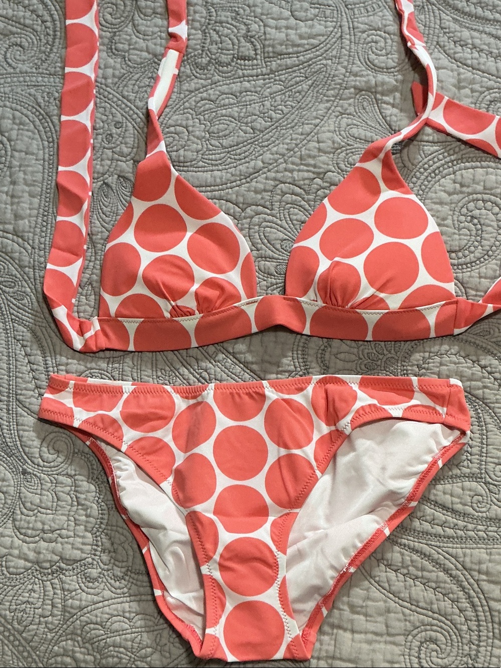 Victoria’s Secret coral and white polkadot bikini. Women’s size small. NWT.